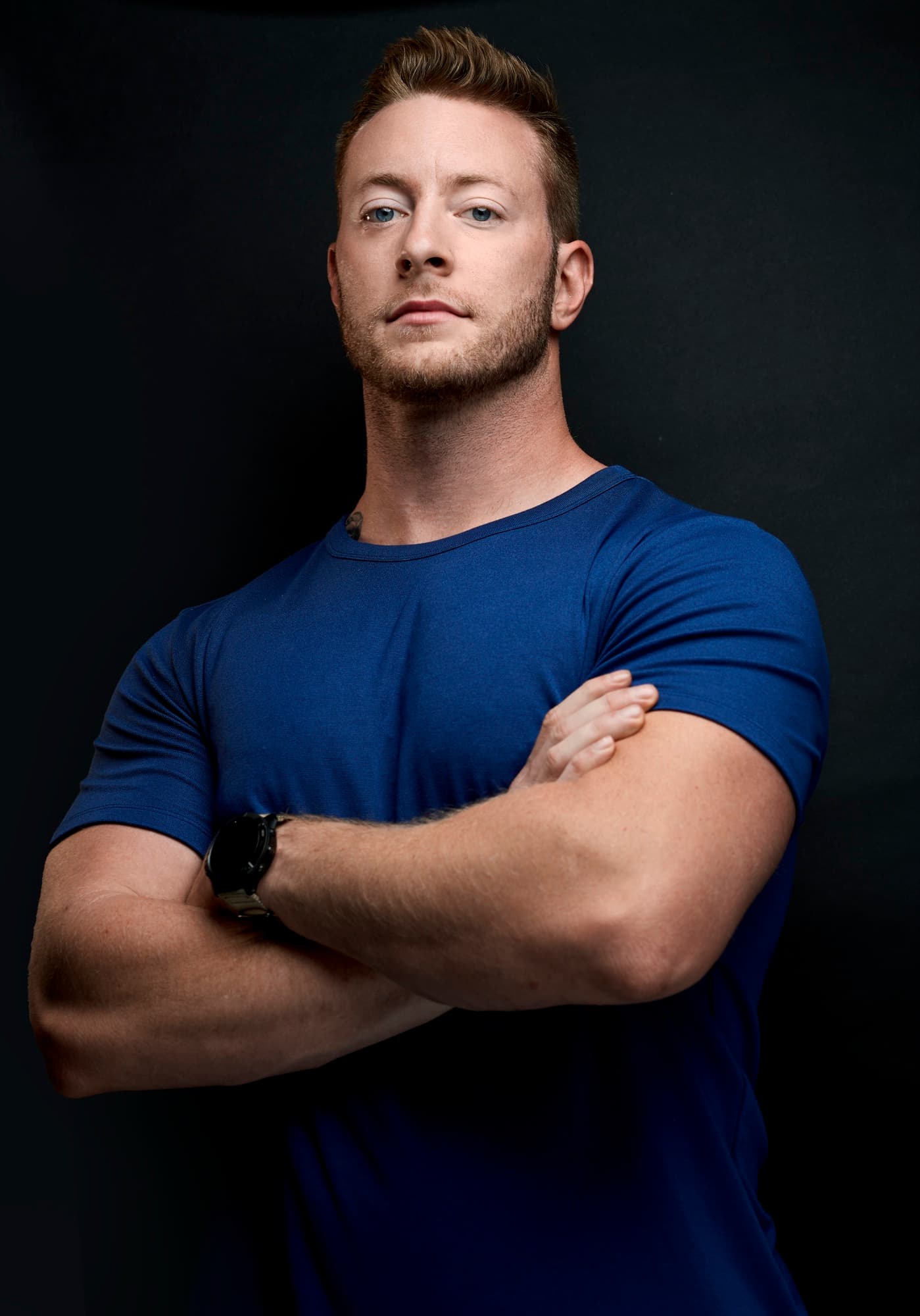 Professional, dark, arms crossed