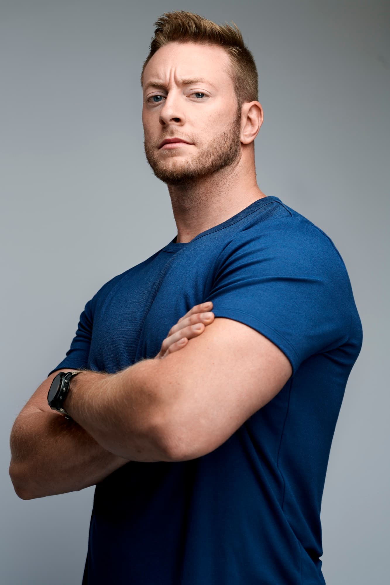 Professional, gray, arms crossed